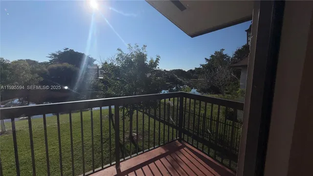 a balcony with wooden floor