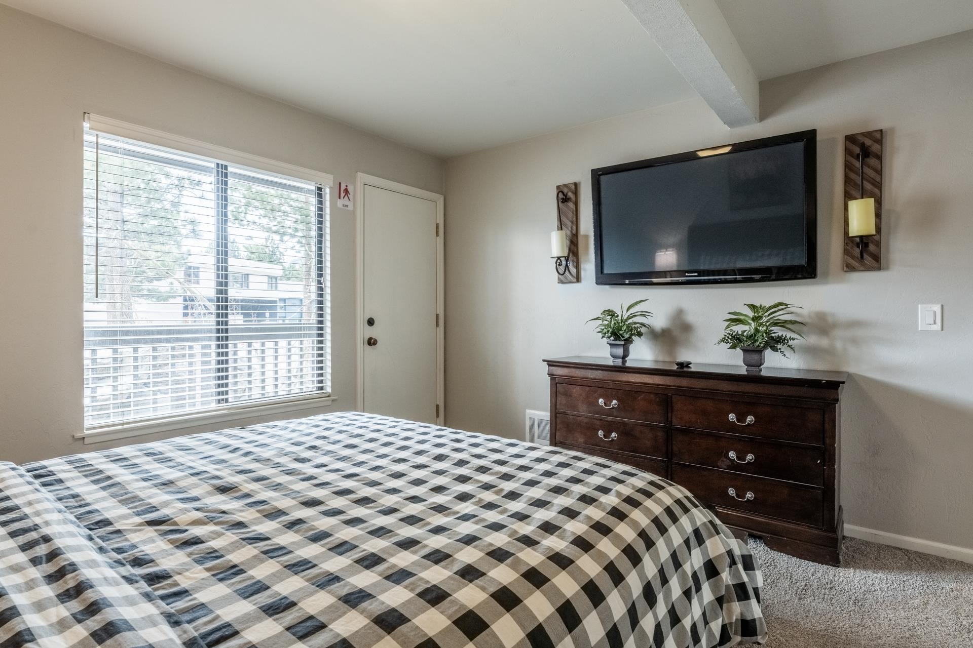 362 Old Mammoth Road, Unit 4 Mammoth Lakes, CA 93546 - Photo 24 of 50 Bedroom featuring light colored carpet and beam ceiling