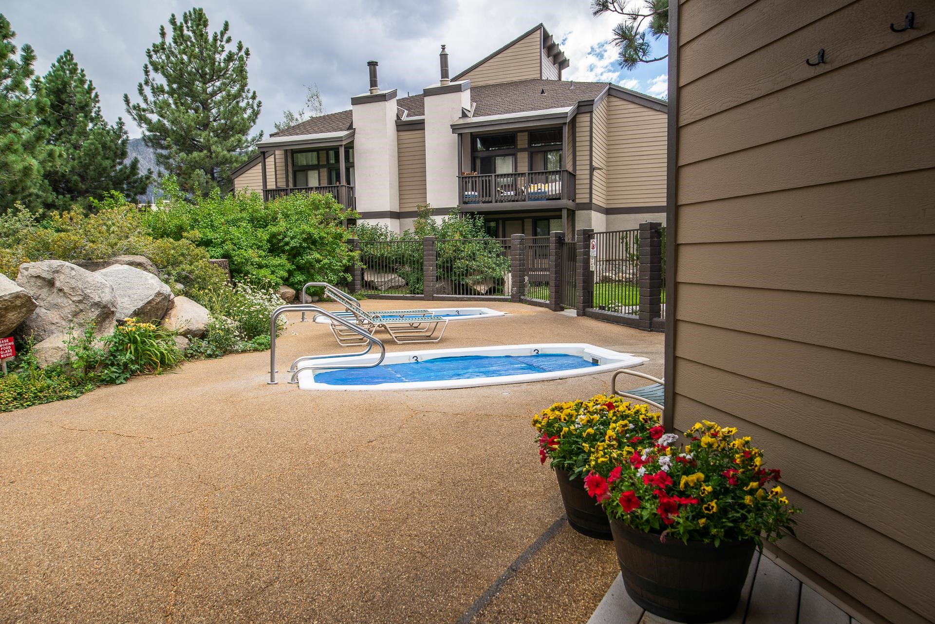 362 Old Mammoth Road, Unit 4 Mammoth Lakes, CA 93546 - Photo 42 of 50 View of pool with a balcony and a community hot tub