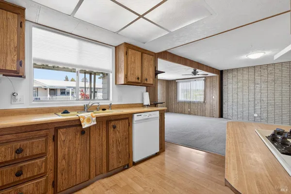 a view of a swimming pool with outdoor seating