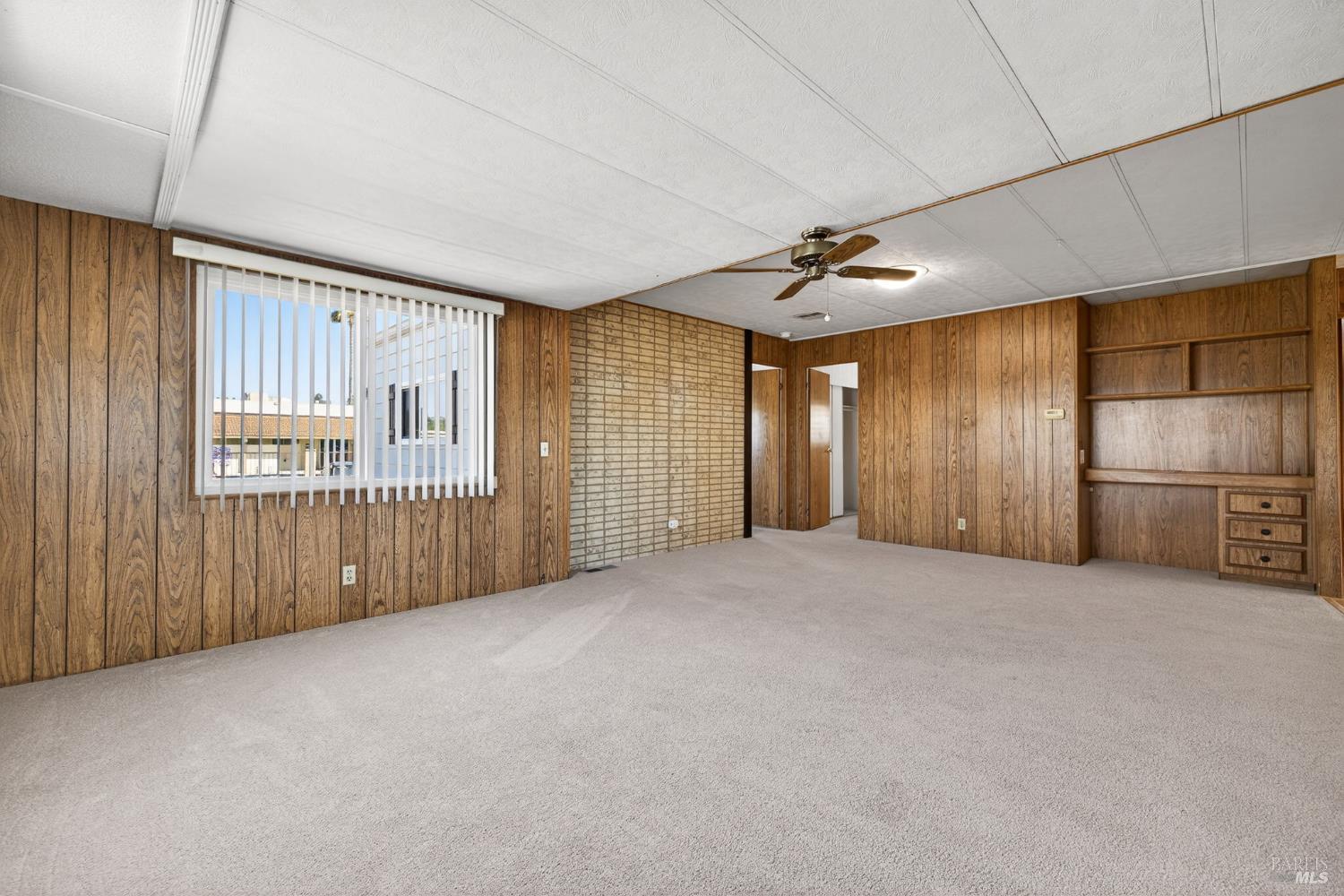 92 Anacapa Drive Santa Rosa, CA 95403 - Photo 25 of 46 a view of a livingroom with a ceiling fan and window
