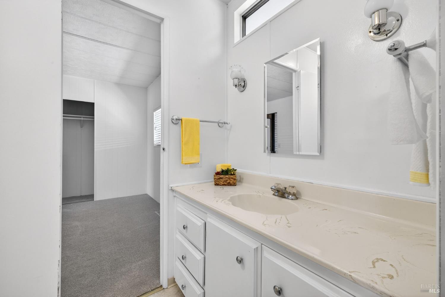 92 Anacapa Drive Santa Rosa, CA 95403 - Photo 27 of 46 a bathroom with a sink and a mirror