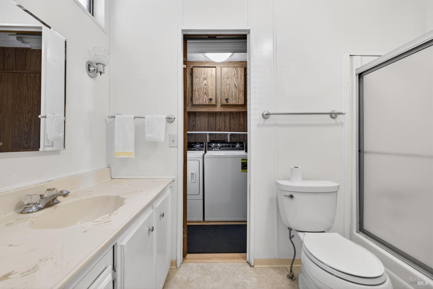 92 Anacapa Drive Santa Rosa, CA 95403 - Photo 28 of 46 a bathroom with a sink a toilet and shower