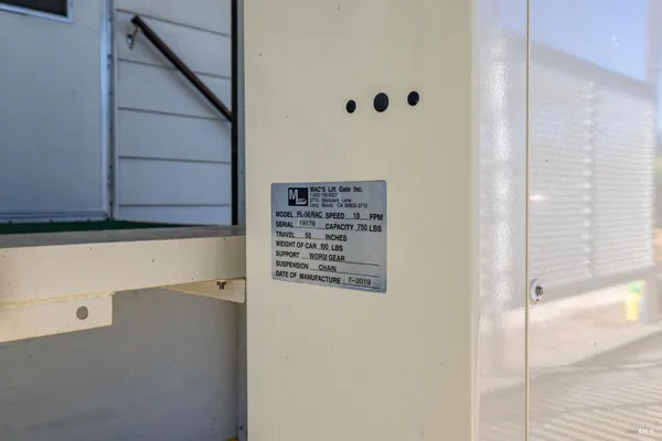a view of a house with a yard porch and sitting area