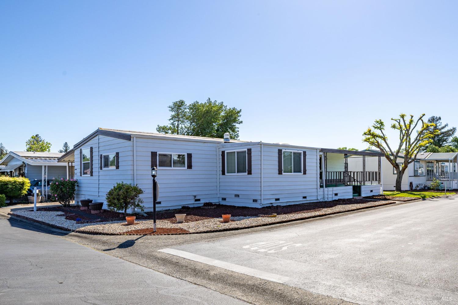 92 Anacapa Drive Santa Rosa, CA 95403 - Photo 7 of 46 a front view of a house with a yard and garage