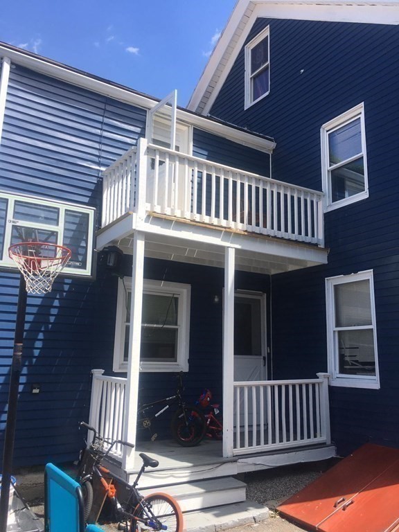 34 Grove Street Lynn, MA 01905 - Photo 32 of 37 a view of an house with a porch