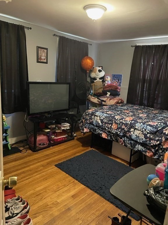 34 Grove Street Lynn, MA 01905 - Photo 37 of 37 a room with furniture and a flat screen tv