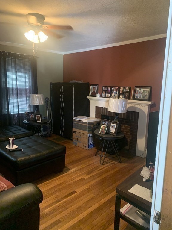 34 Grove Street Lynn, MA 01905 - Photo 9 of 37 a living room with furniture
