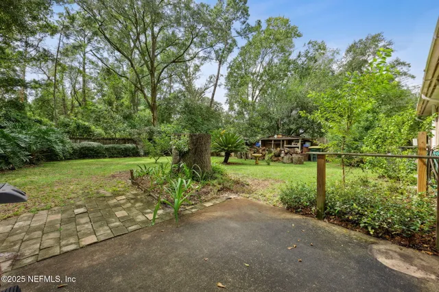 a view of a garden with a lake