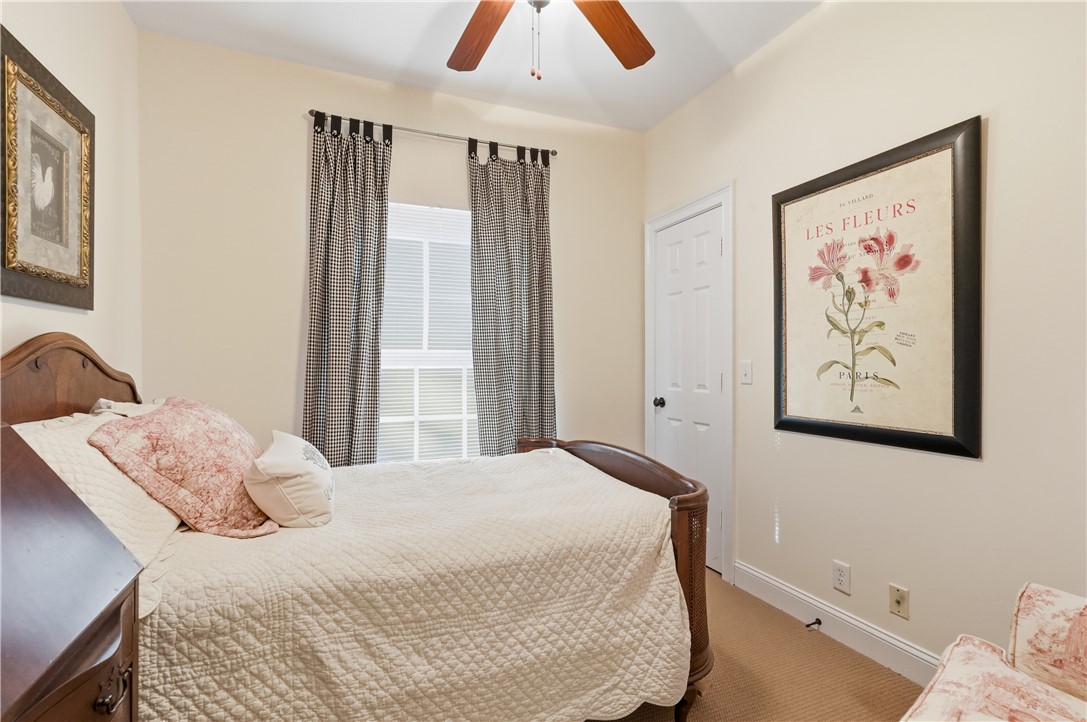 180 Palm Street St. Simons Island, GA 31522 - Photo 13 of 17 Guest Bedroom with walk-in-closet and second entry to bathroom