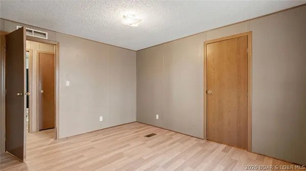 $214,900 | 26877 Arrowhead Cove Drive, Rocky Mount, MO 65072
