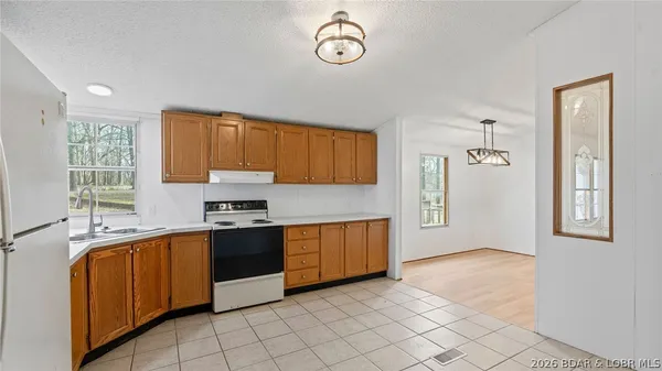 $214,900 | 26877 Arrowhead Cove Drive, Rocky Mount, MO 65072