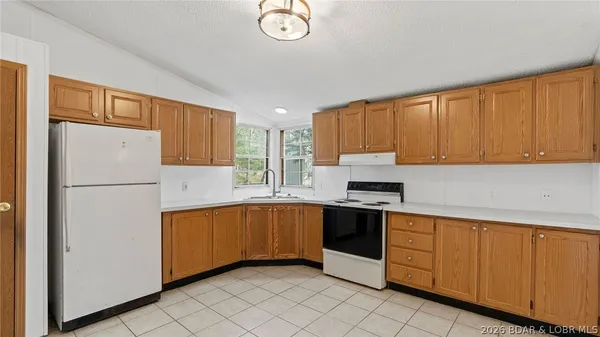$214,900 | 26877 Arrowhead Cove Drive, Rocky Mount, MO 65072
