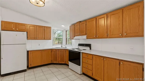 $214,900 | 26877 Arrowhead Cove Drive, Rocky Mount, MO 65072