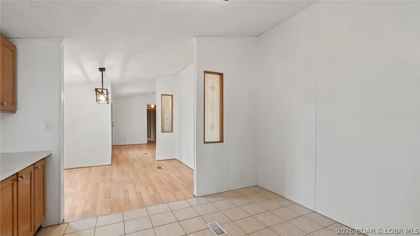 $214,900 | 26877 Arrowhead Cove Drive, Rocky Mount, MO 65072