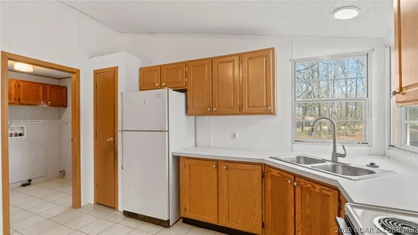 $214,900 | 26877 Arrowhead Cove Drive, Rocky Mount, MO 65072