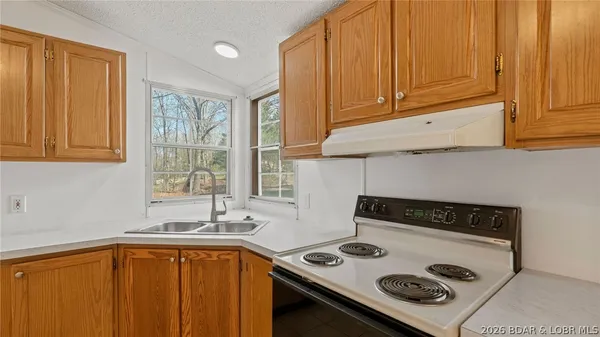 $214,900 | 26877 Arrowhead Cove Drive, Rocky Mount, MO 65072