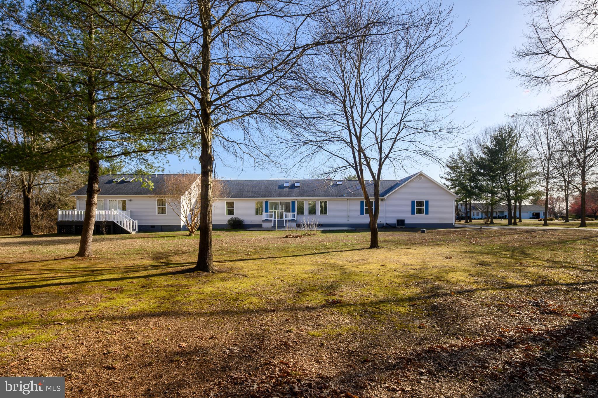 5885 Ketch Road Prince Frederick, MD 20678 - Photo 53 of 83 a view of a large house with large trees and a big yard