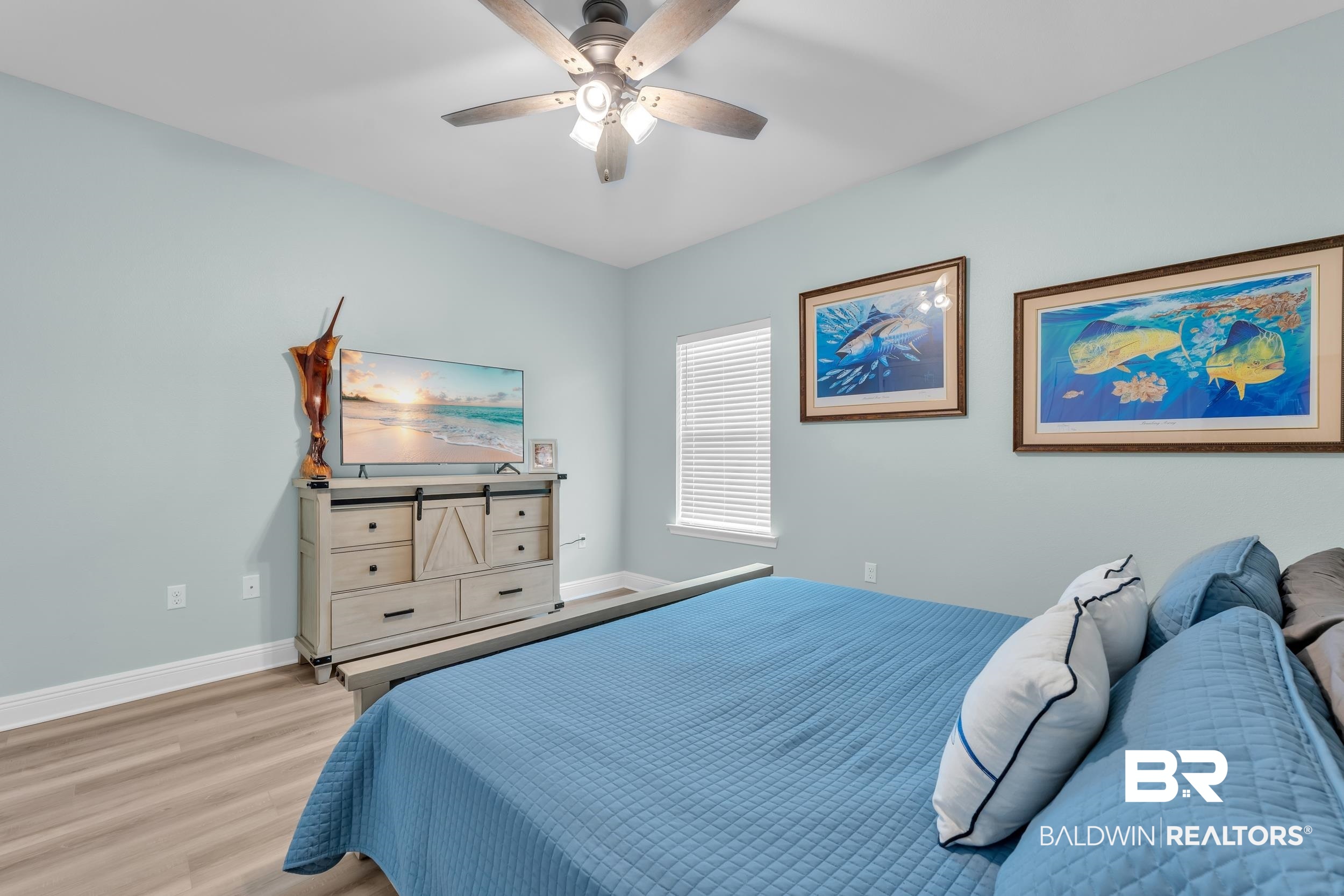 7109 Rocky Rd Loop Gulf Shores, AL 36542 - Photo 26 of 30 Bedroom with a ceiling fan, light wood-style flooring, and baseboards