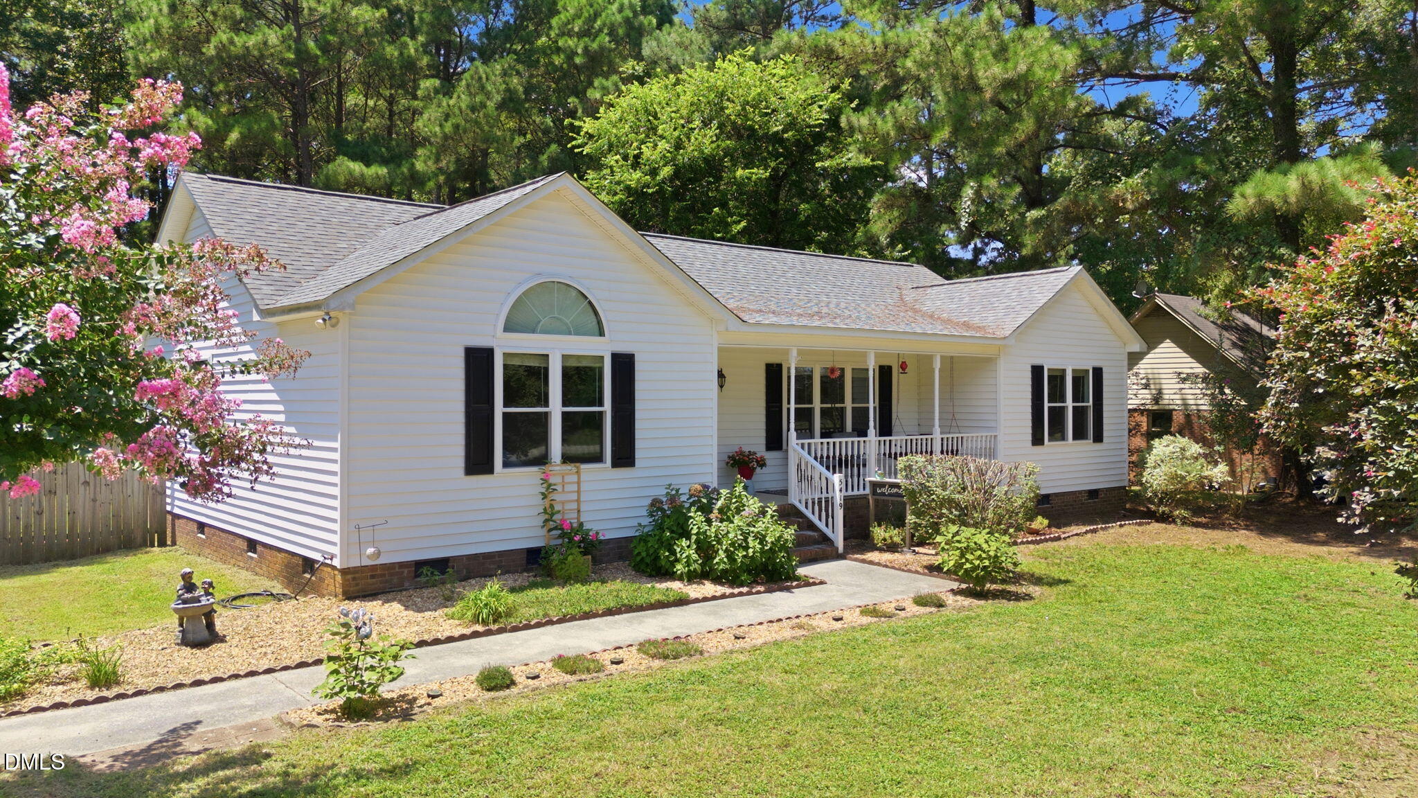 5419 Cleveland Road Clayton, NC 27520 - Photo 1 of 39 Welcoming ranch framed by mature trees
