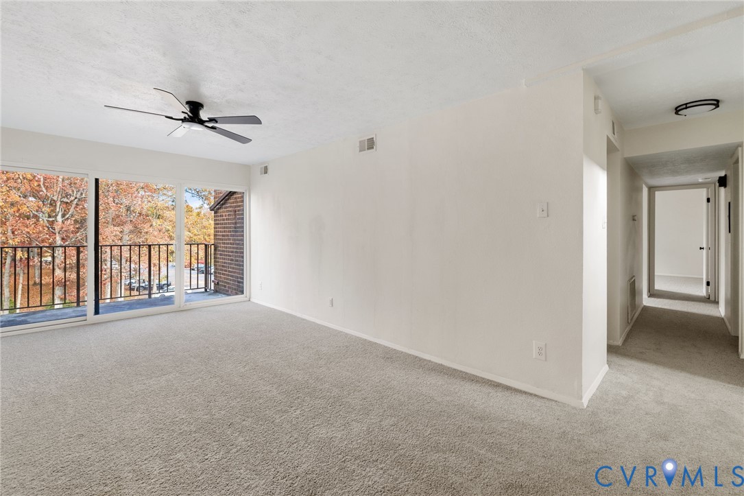 1501 Largo Road, Unit 301 Henrico, VA 23238 - Photo 10 of 40 a view of an empty room with a window