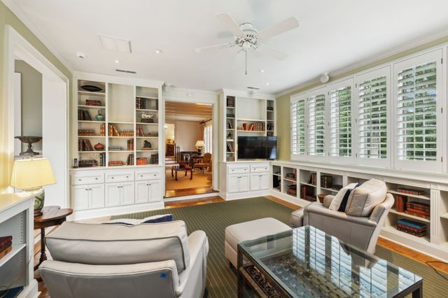 a kitchen with stainless steel appliances granite countertop a stove a sink island and a refrigerator