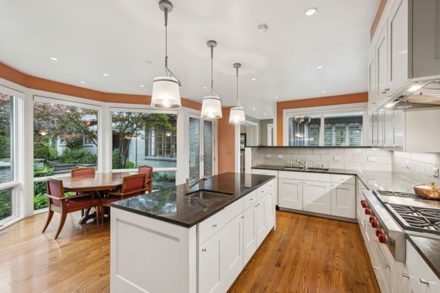 a bathroom with a sink a vanity and a mirror