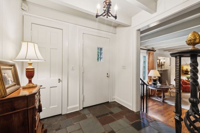 a room with gym equipment and white walls