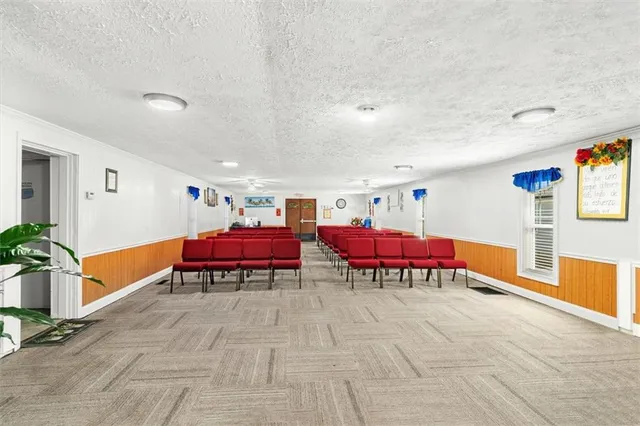 a room with furniture and a rug