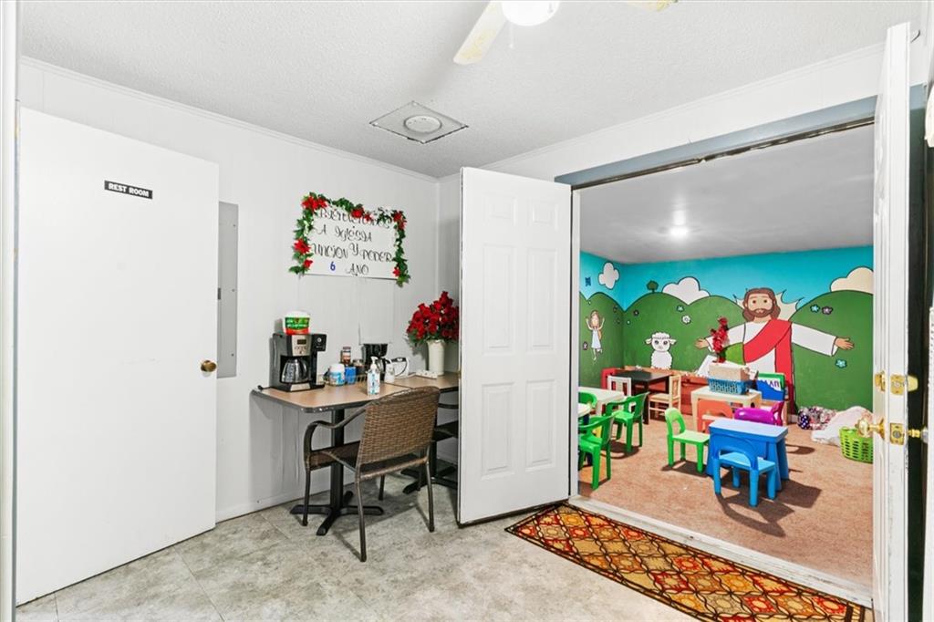 210 Hood Street Calhoun, GA 30701 - Photo 21 of 59 a room with furniture and a rug