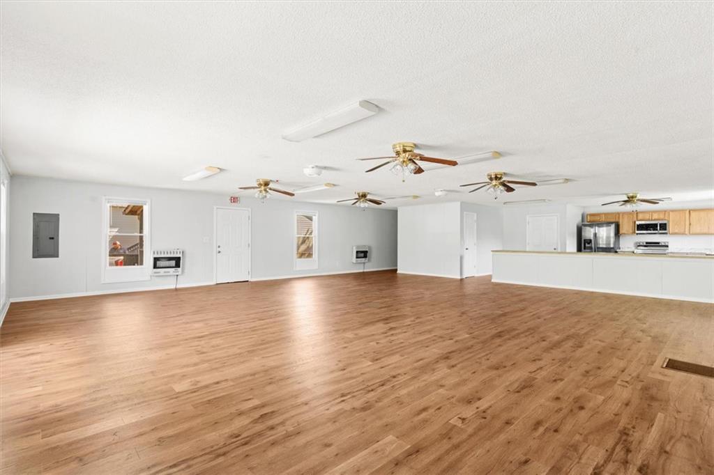 210 Hood Street Calhoun, GA 30701 - Photo 26 of 59 a view of a kitchen with a sink and cabinets