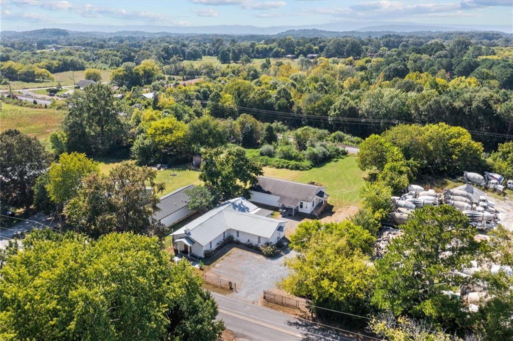 210 Hood Street Calhoun, GA 30701 - Photo 40 of 59 an aerial view of a houses with a yard
