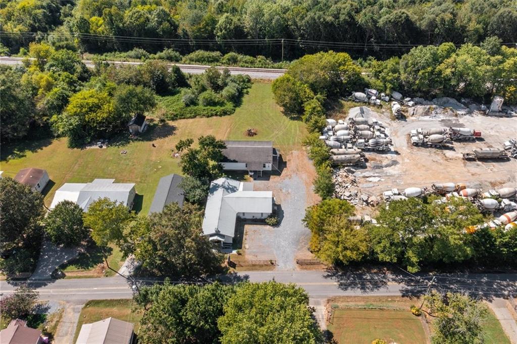 210 Hood Street Calhoun, GA 30701 - Photo 42 of 59 an aerial view of a house with a lake view