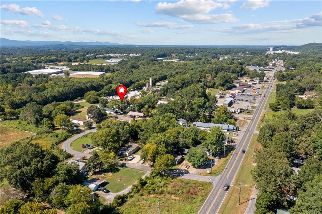210 Hood Street Calhoun, GA 30701 - Photo 10 of 59 an aerial view of residential houses with outdoor space and trees