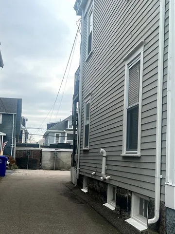 a view of a terrace with wooden walls
