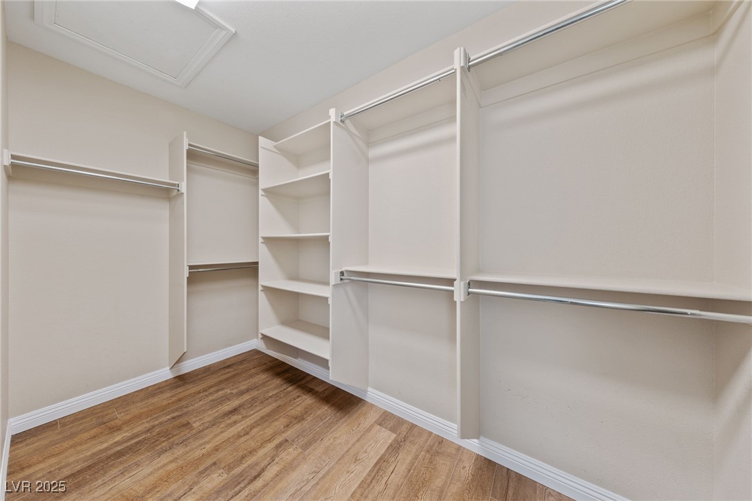 9024 Rendon Street Las Vegas, NV 89143 - Photo 26 of 52 Primary Bedroom Walk-in Closet