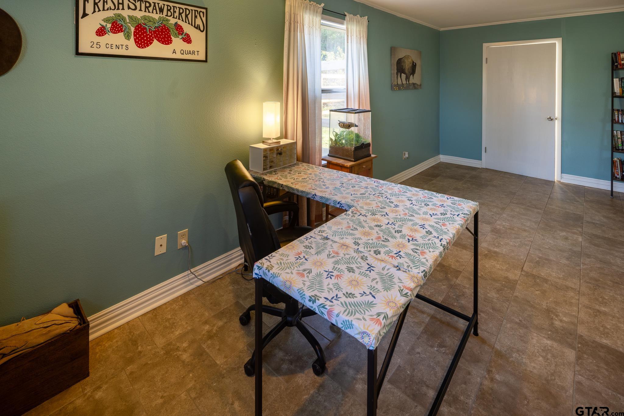 10733 County Road 4150 Tyler, TX 75704 - Photo 21 of 48 a view of a workspace with furniture