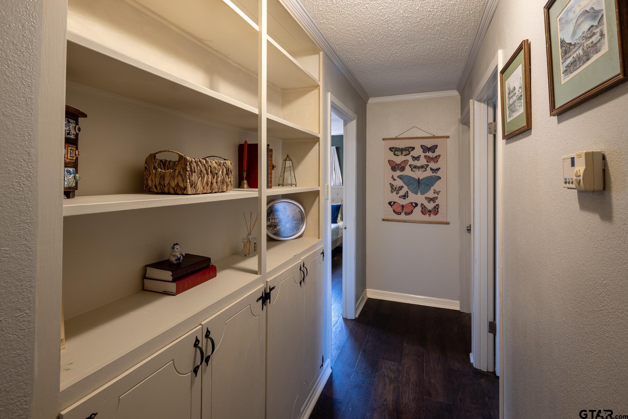 10733 County Road 4150 Tyler, TX 75704 - Photo 23 of 48 a view of walk in closet with clothes and shoes