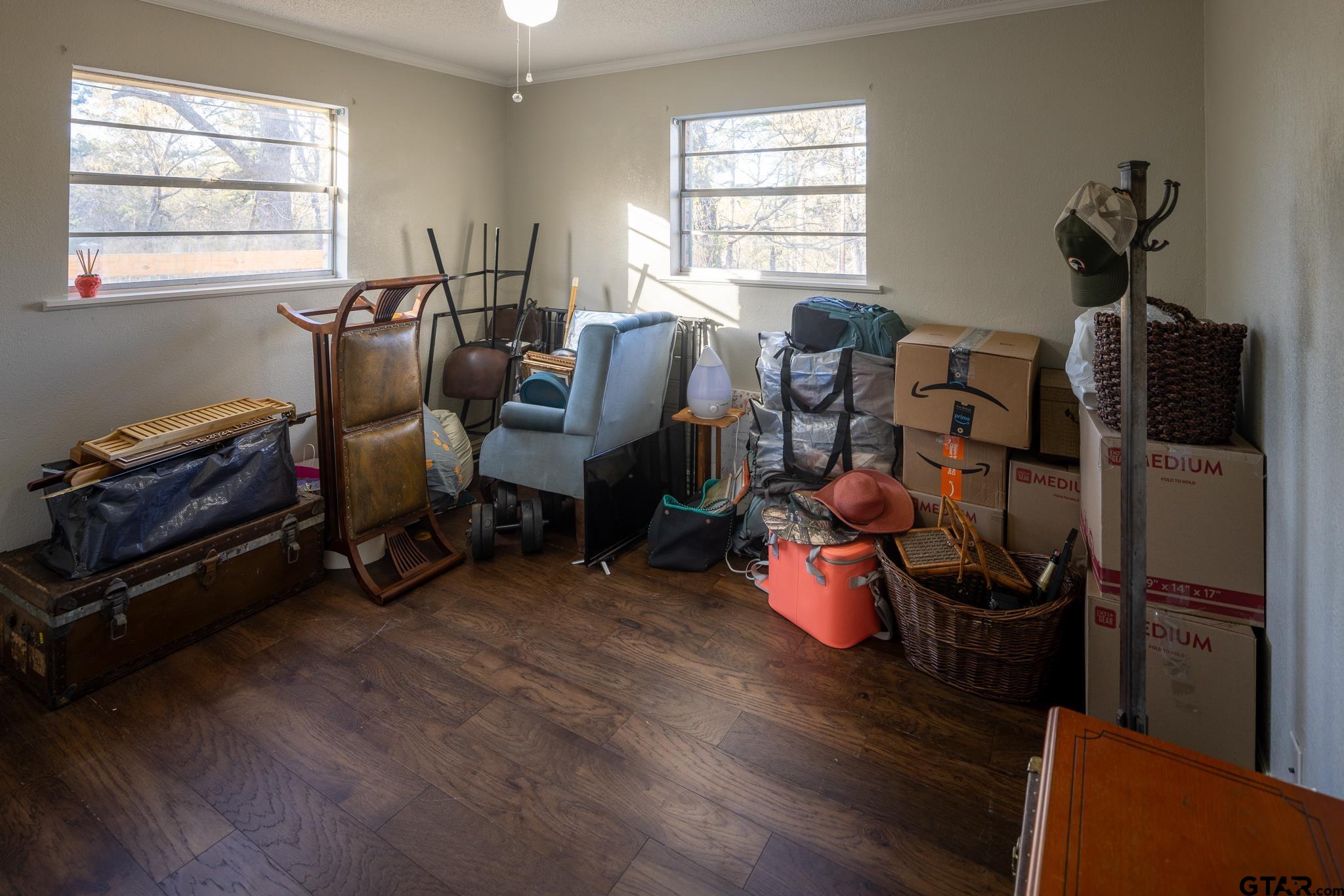 10733 County Road 4150 Tyler, TX 75704 - Photo 29 of 48 a room with furniture and a window
