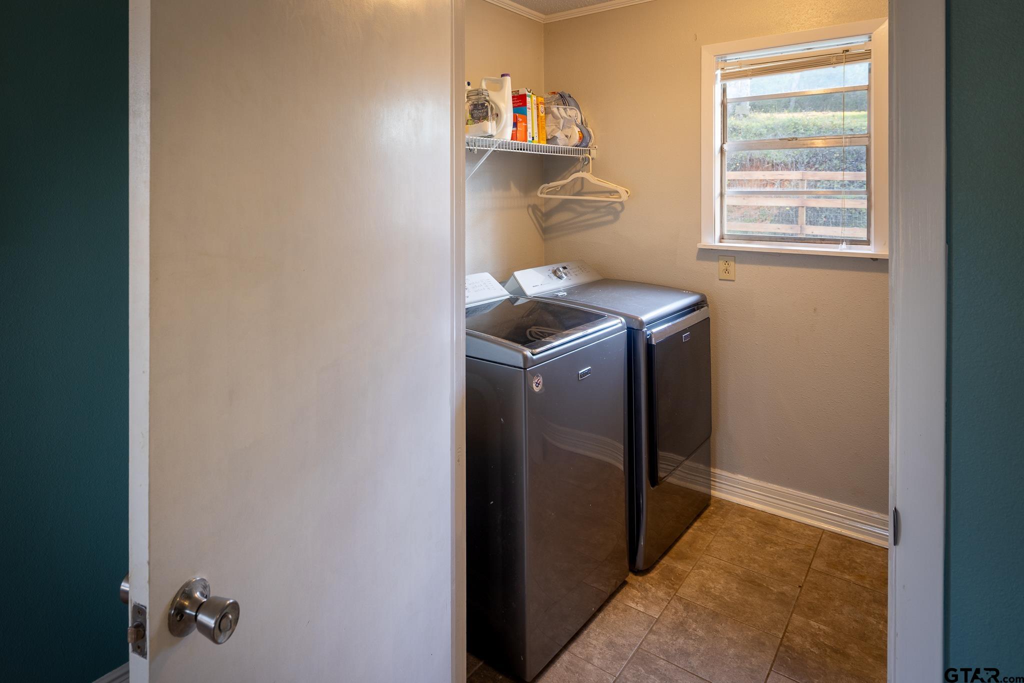 10733 County Road 4150 Tyler, TX 75704 - Photo 30 of 48 a utility room with dryer and washer