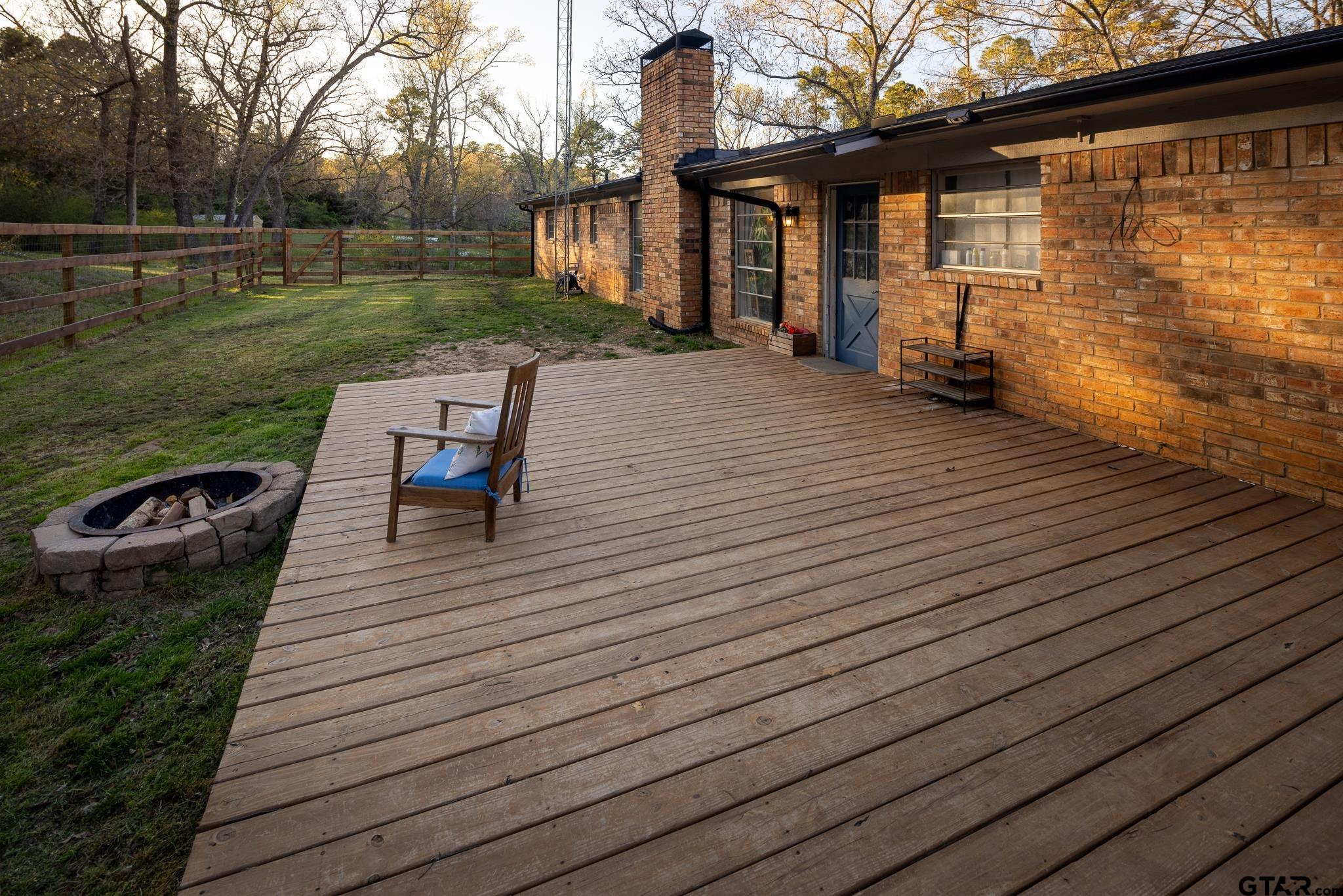 10733 County Road 4150 Tyler, TX 75704 - Photo 32 of 48 a view of a deck with chairs