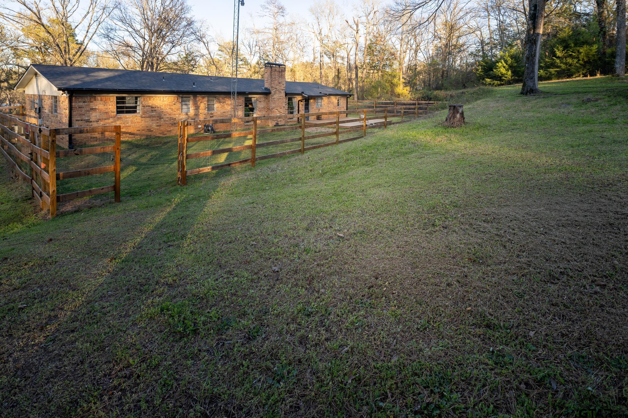10733 County Road 4150 Tyler, TX 75704 - Photo 34 of 48 a view of a yard with a slide