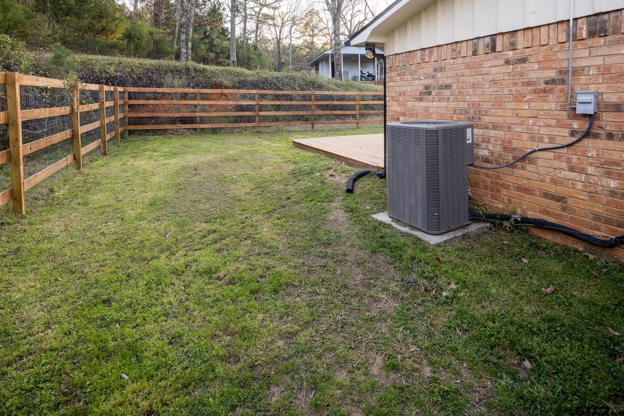 10733 County Road 4150 Tyler, TX 75704 - Photo 41 of 48 a view of a bench in a backyard