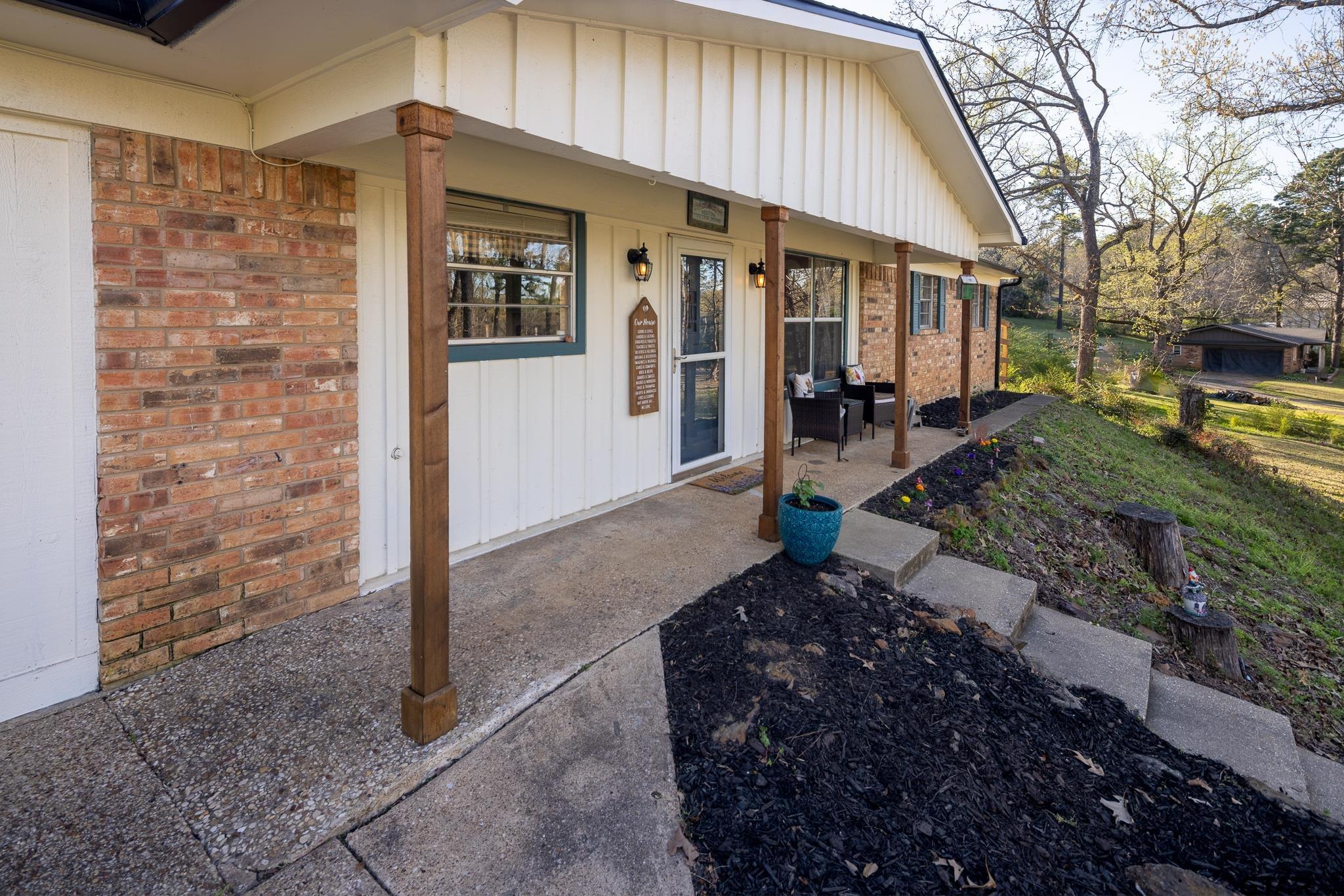 10733 County Road 4150 Tyler, TX 75704 - Photo 46 of 48 a front view of a house with garden
