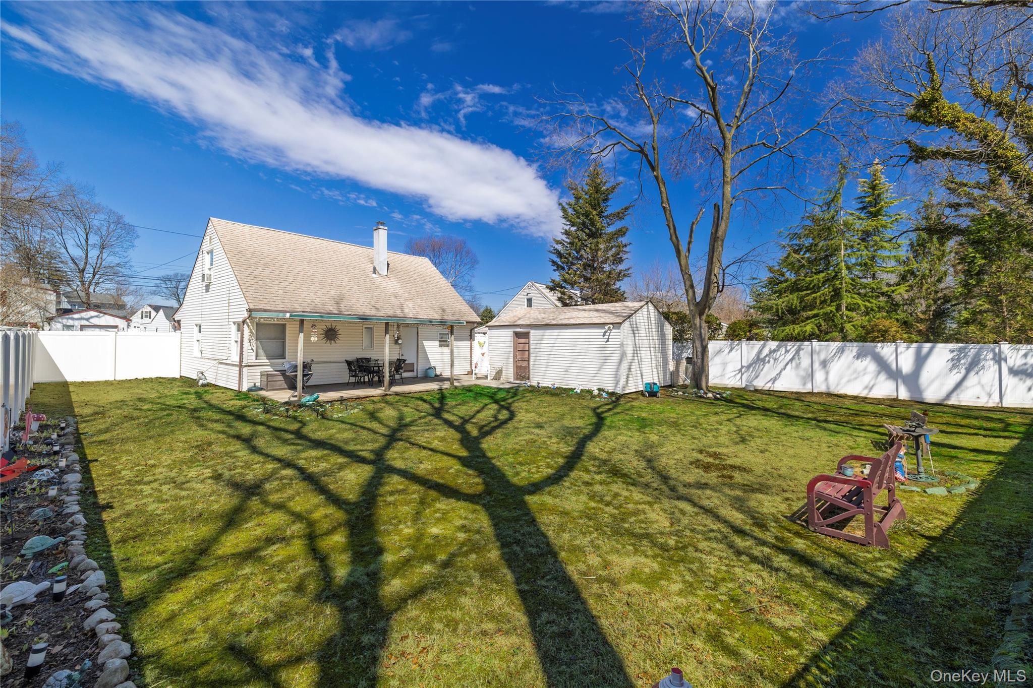 712 Nightingale Road West Hempstead, NY 11552 - Photo 18 of 23 view of expansive back yard and detached garage