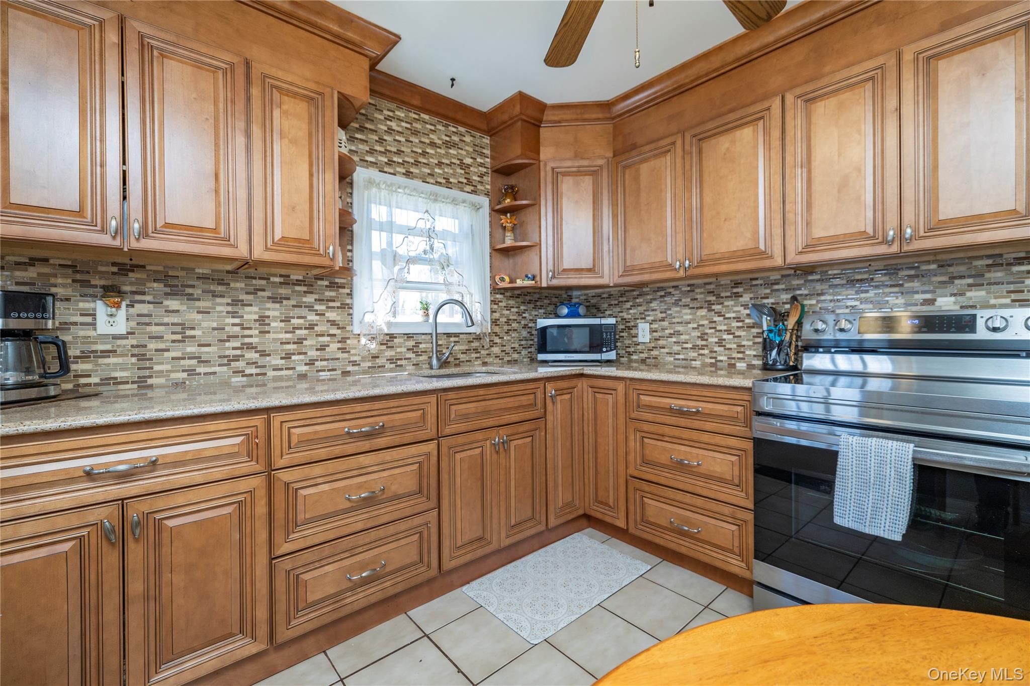712 Nightingale Road West Hempstead, NY 11552 - Photo 7 of 23 Plenty of natural light from window over the sink
