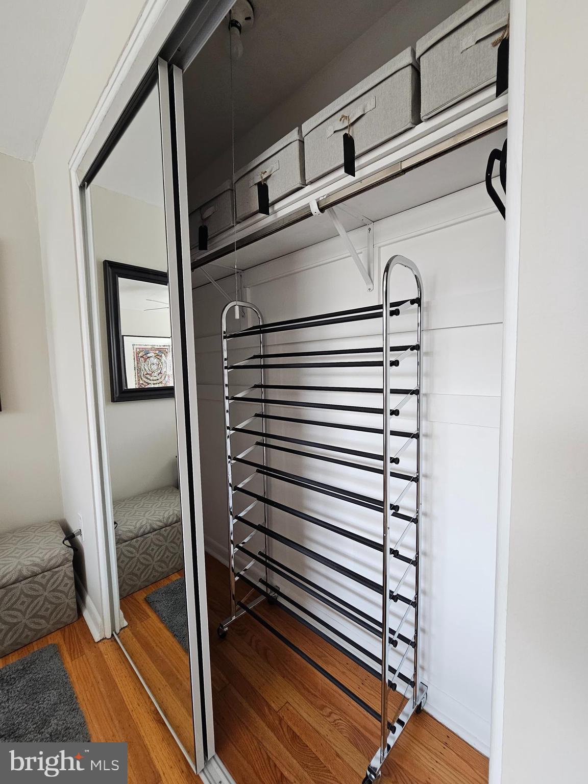 1334 Montgomery Avenue, Unit B1 Narberth, PA 19072 - Photo 16 of 17 a view of a hallway with wooden floor and a bathroom