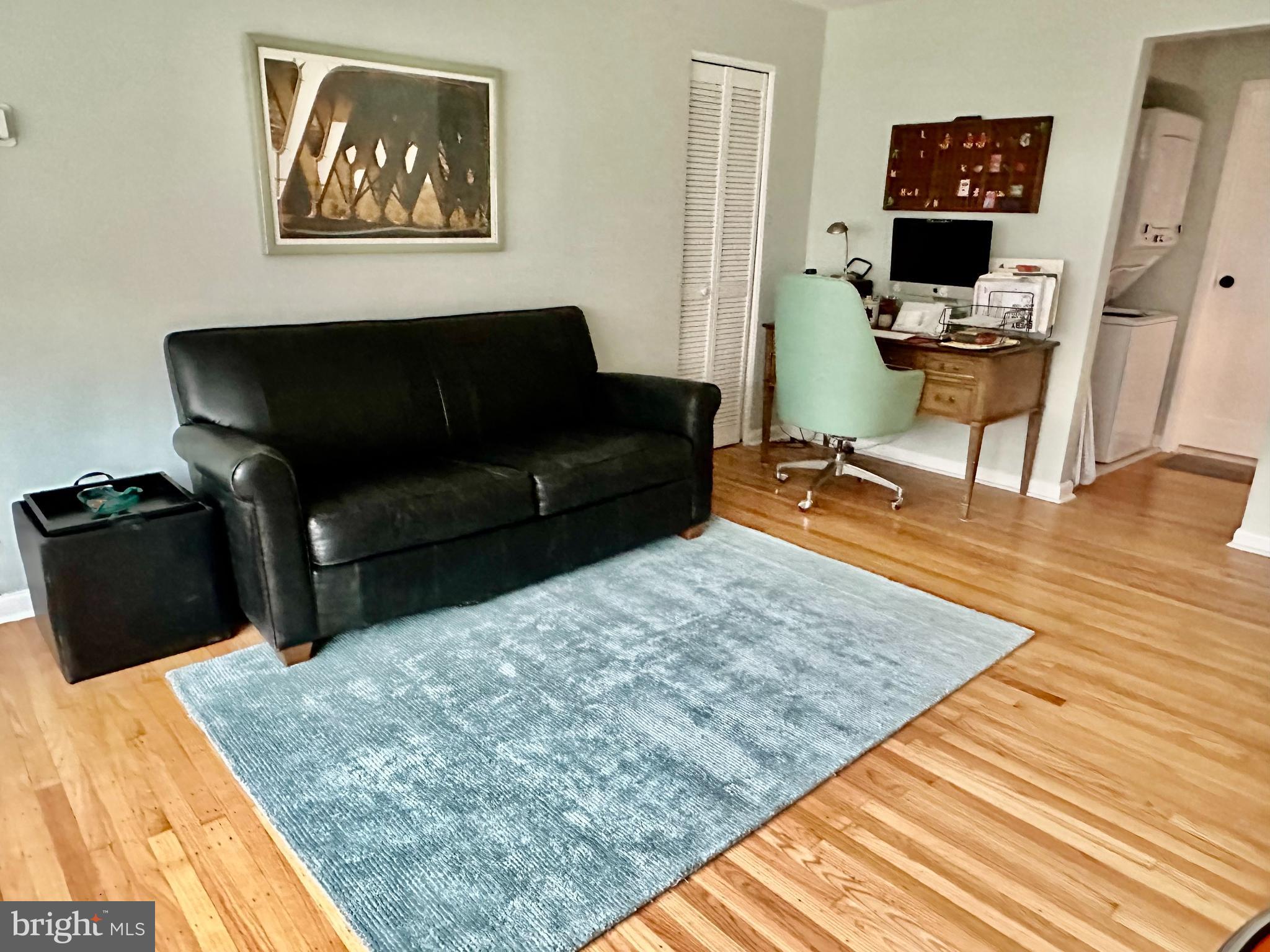 1334 Montgomery Avenue, Unit B1 Narberth, PA 19072 - Photo 10 of 17 a living room with furniture and wooden floor