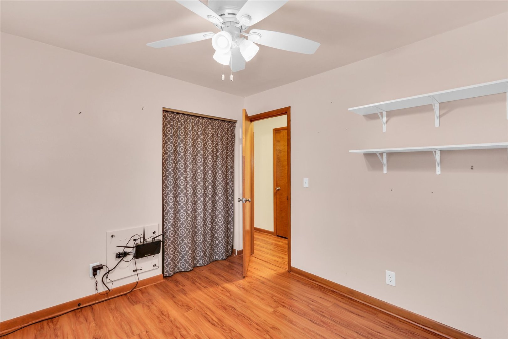 1908 Barberry Circle Champaign, IL 61821 - Photo 15 of 30 wooden floor in an empty room with a window
