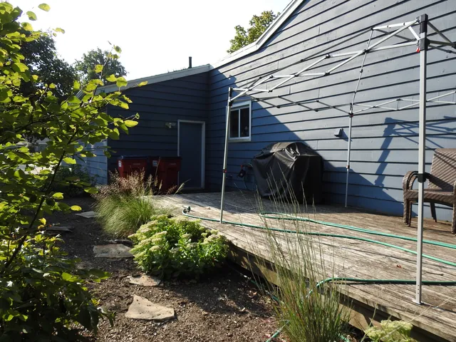 a view of a yard covered with snow